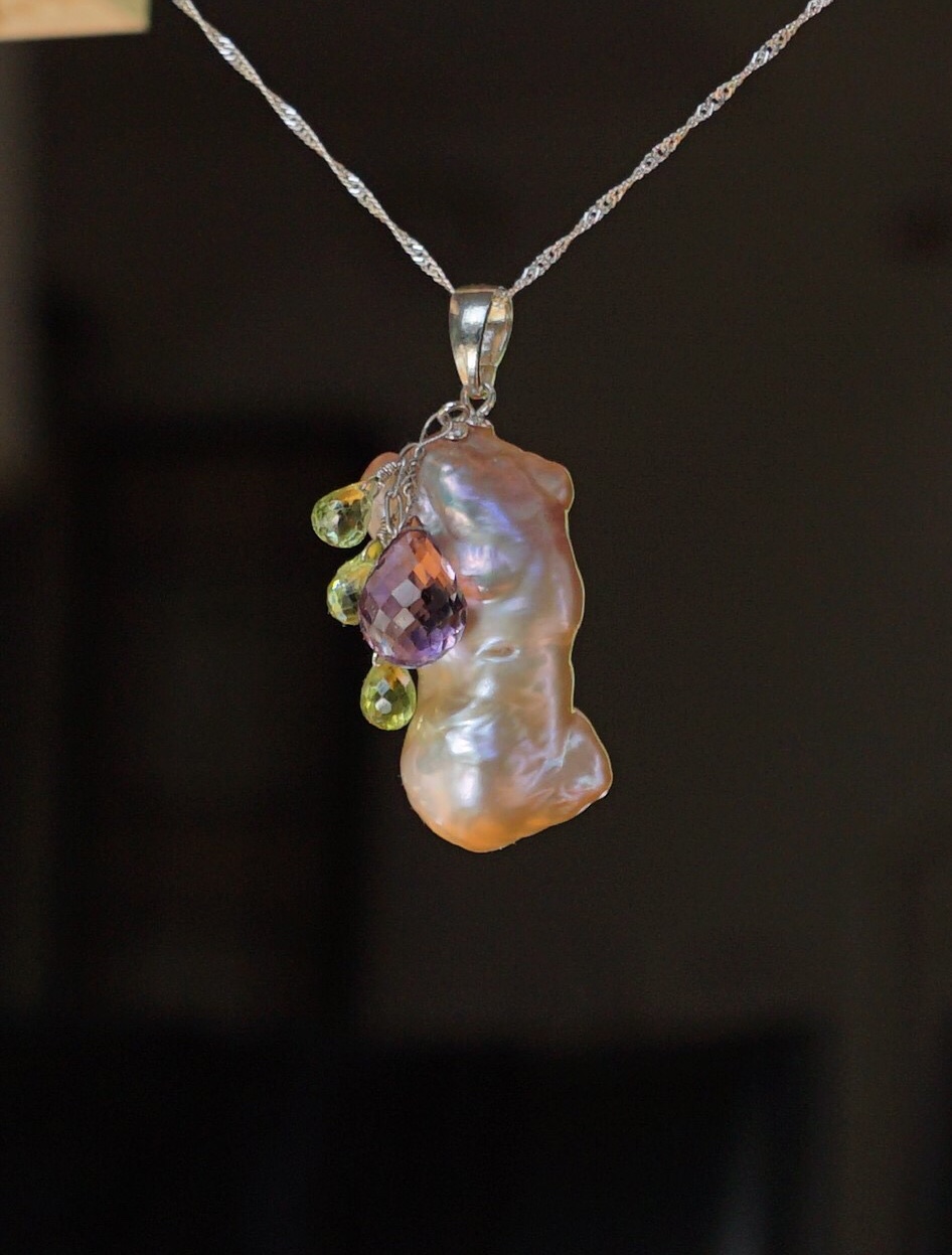 9.  Female torso pink focal pearl, sterling silver, peridot, amethyst